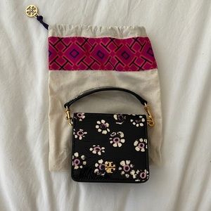 Tory Burch wallet on a chain